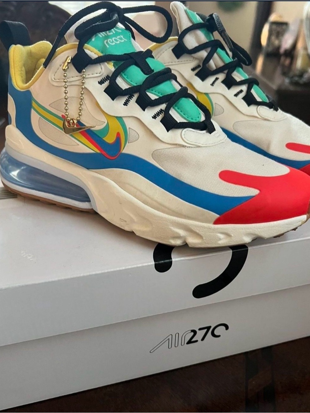 Nike Multicolor Air Max 270 React Sneakers — White, Blue, Red, Teal, Yellow